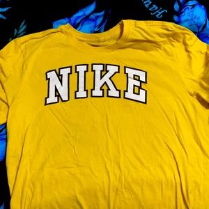 yellow nike shirt